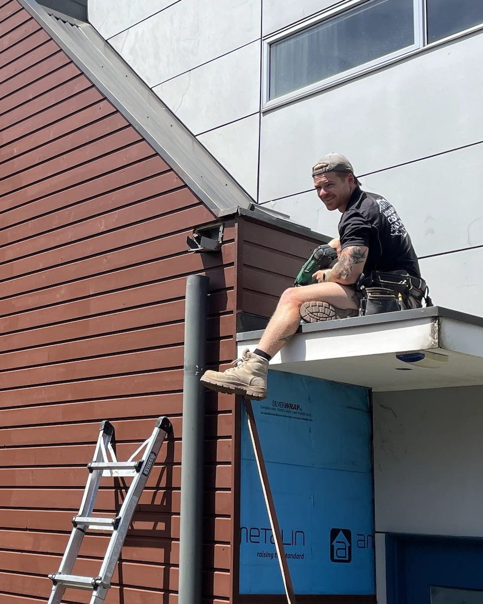 The Melbourne Cladding Solutions team recladding a Melbourne home