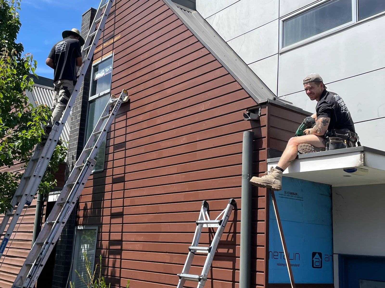 The Melbourne Cladding Solutions team recladding a Melbourne home