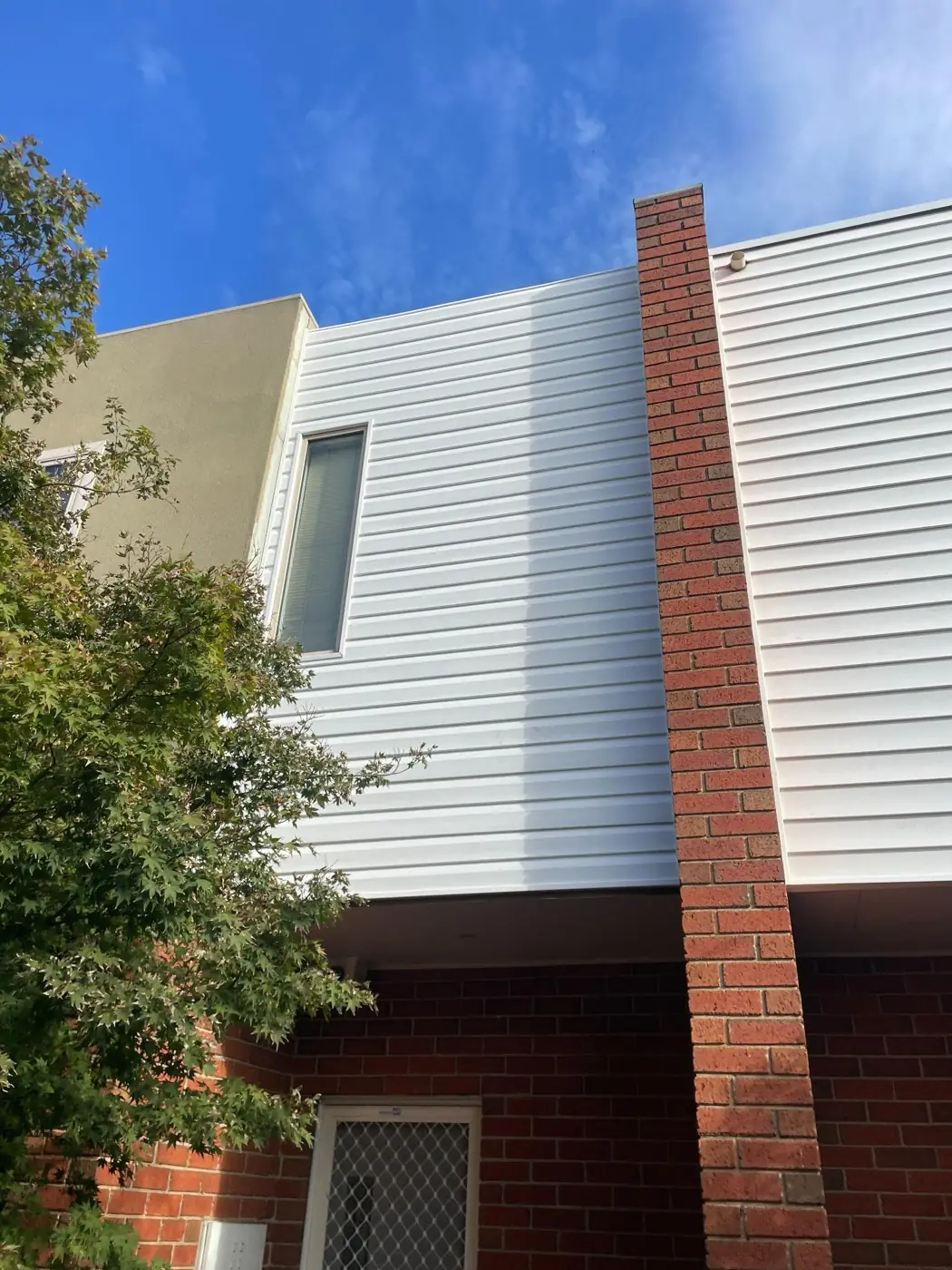 Coburg · Completed Austech vinyl weatherboard façade.