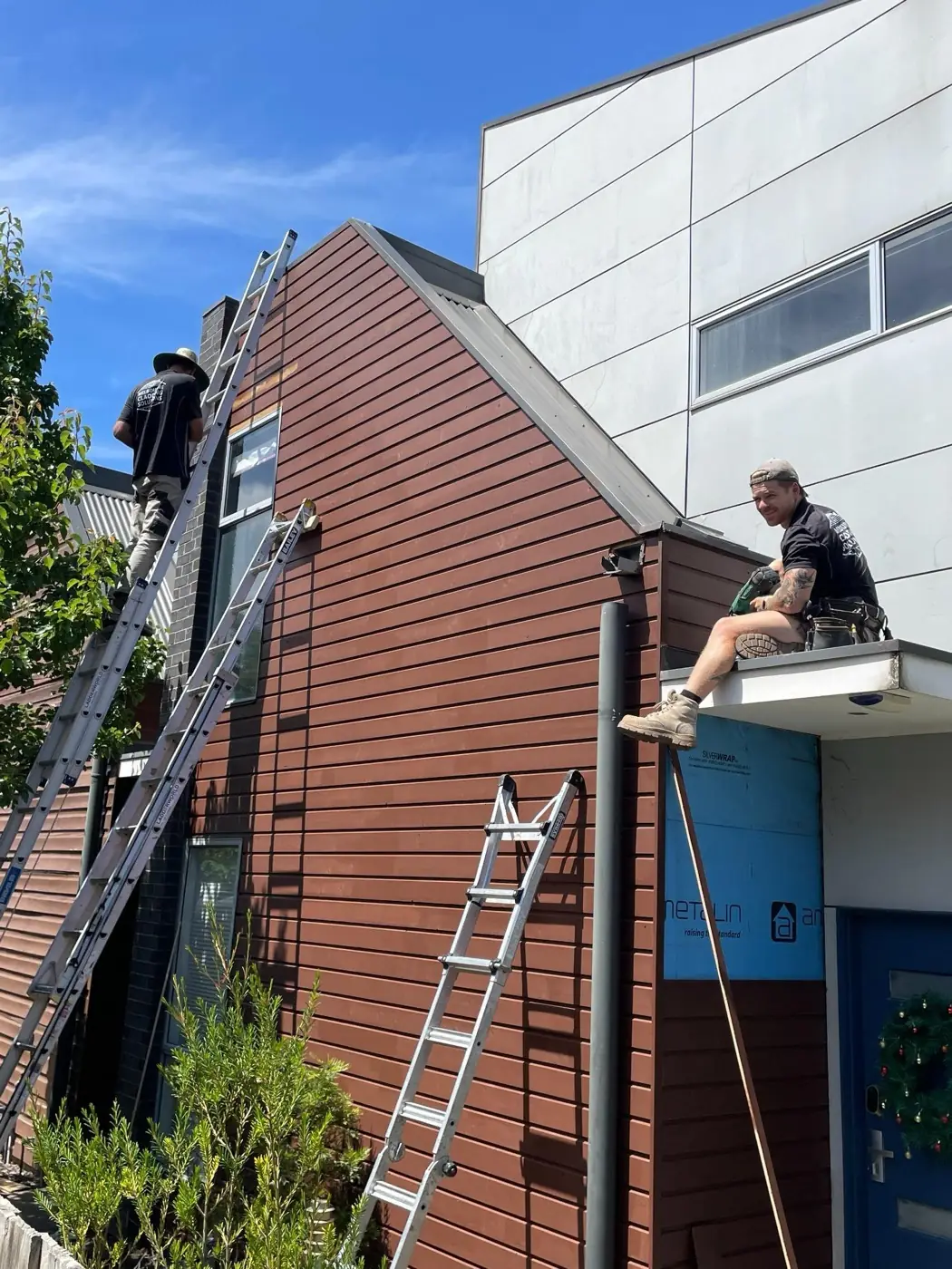Feature cladding installation in progress.