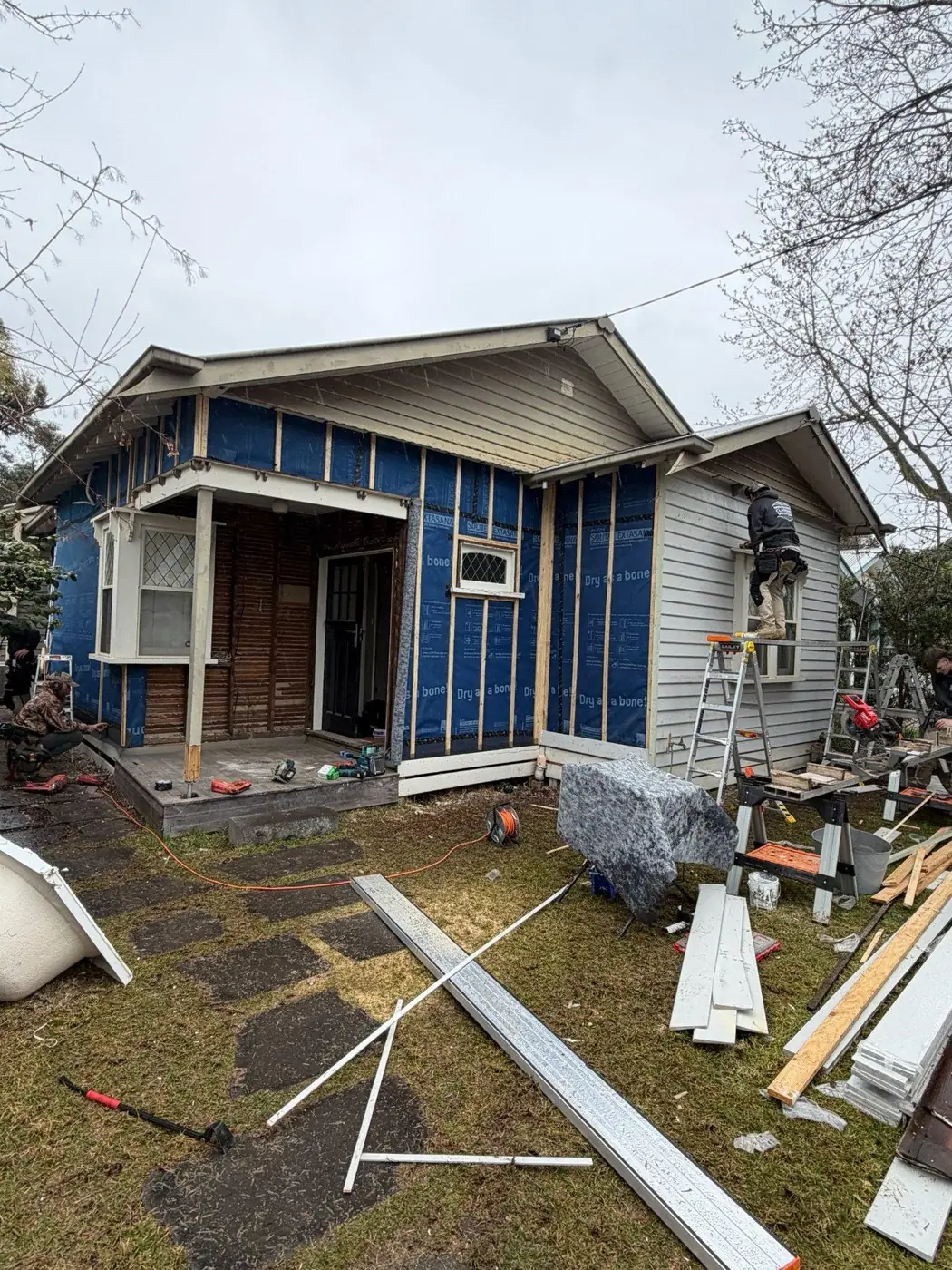 Northcote weatherboard replacement: weatherboard installation underway.
