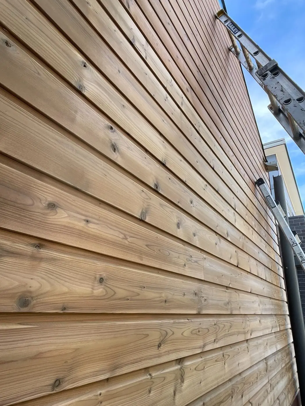 Timber shiplap feature cladding installation.
