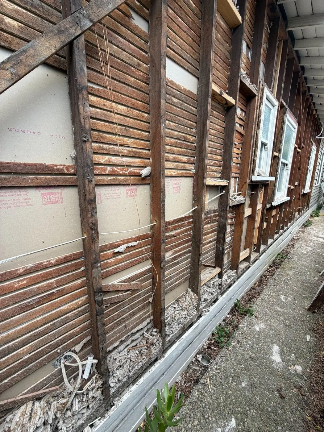 Existing wall opened and assessed.
